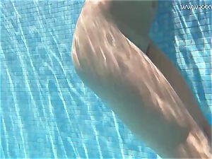 Jessica Lincoln smallish tatted Russian nubile in the pool