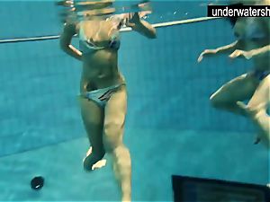 two marvelous amateurs flashing their bodies off under water